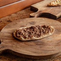 Sfiha shamia with laban and pomegranate molasses